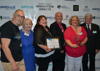 UNE’s Professor Tony Sorensen presented the “Professional and Government Services” category winning trophy to the Liverpool Plains Shire Council’s RV Strategy, represented by Cr. Virginia Black, Donna Ausling, Mayor Andrew Hope, Nikki Robertson and Cr. Ian Lobsey. 